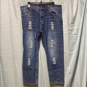 Denim Culture size 38X30 Classic Blue Distressed Women’s crop‎ Jeans